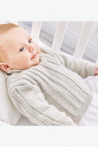 Modello Sweetie pull con trecce per neonato